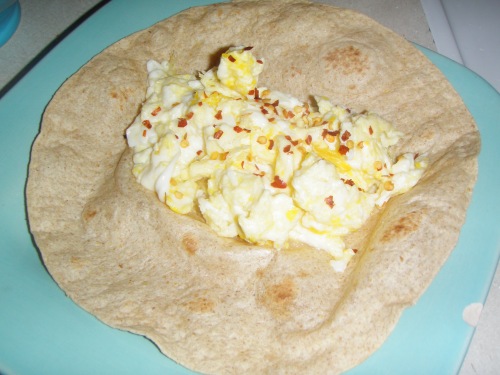 WW Tortilla with 2 scrambled eggs and some red pepper flakes for kick